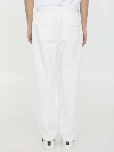 Shop Gucci Web Detailing Trousers In White