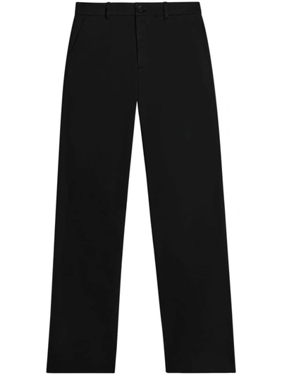 Shop Axel Arigato Trousers In Black