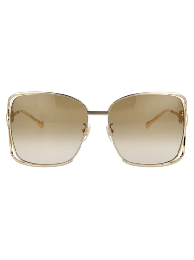 Shop Gucci Sunglasses In 004 Gold Gold Brown