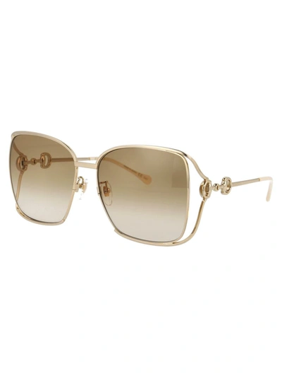 Shop Gucci Sunglasses In 004 Gold Gold Brown
