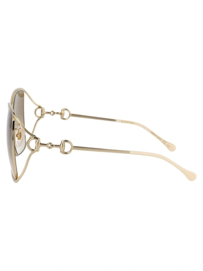 Shop Gucci Sunglasses In 004 Gold Gold Brown