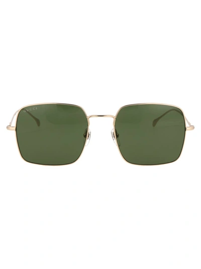 Shop Gucci Sunglasses In 002 Gold Gold Green