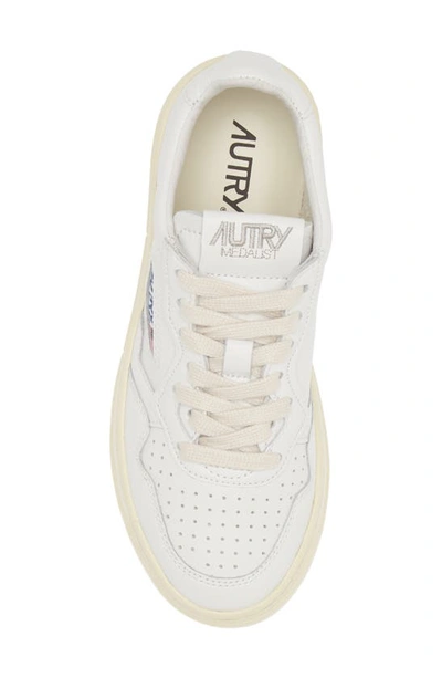 Shop Autry Medalist Low Sneaker In White/ White