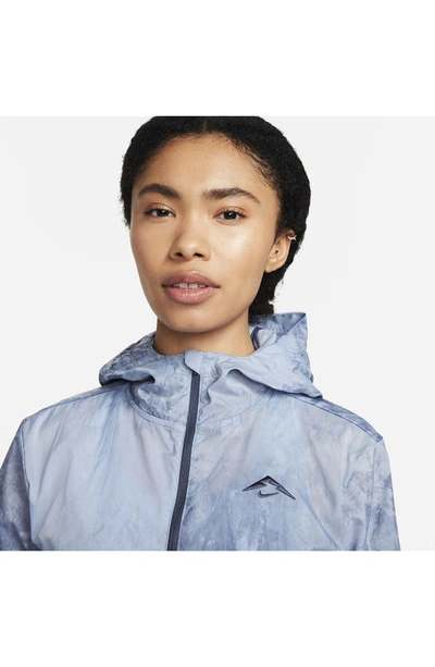 Shop Nike Trail Repel Water Repellent Packable Jacket In Light Armory Blue