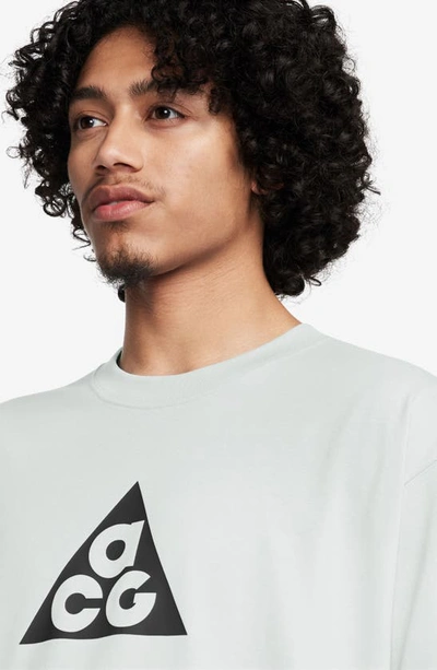 Shop Nike Dri-fit Acg Oversize Graphic T-shirt In Summit White
