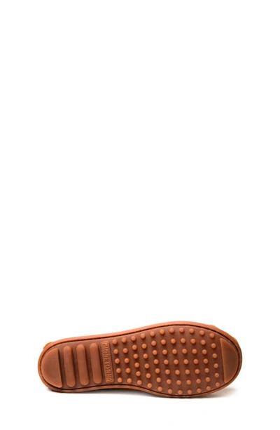 Shop Minnetonka Kids' Thunderbird 'animikii' Slip-on Shoe In Brown