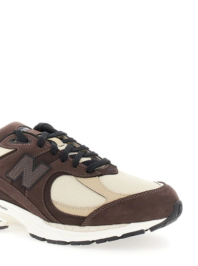 Shop New Balance 2002 In Brown