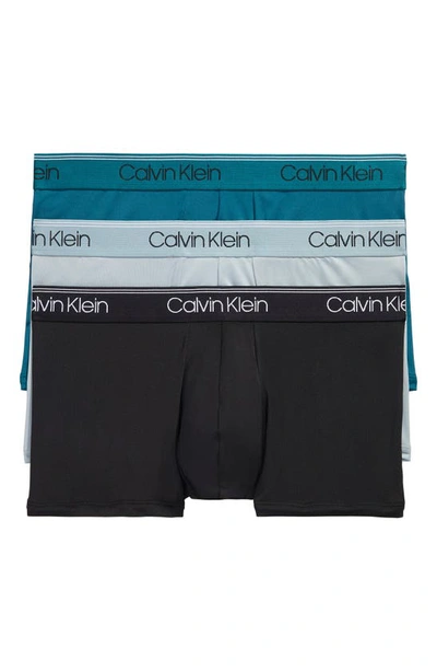 Shop Calvin Klein 3-pack Low Rise Microfiber Stretch Trunks In Black/ Arona/ Teal
