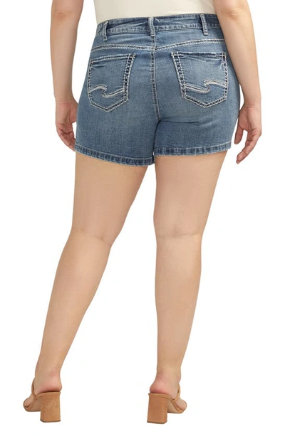 Shop Silver Jeans Co. Elyse Mid Rise Denim Shorts In Indigo
