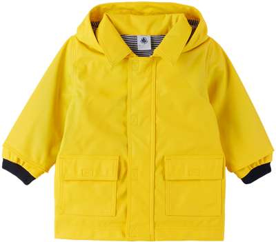 Shop Petit Bateau Baby Yellow Coated Rain Coat In 01 Jaune