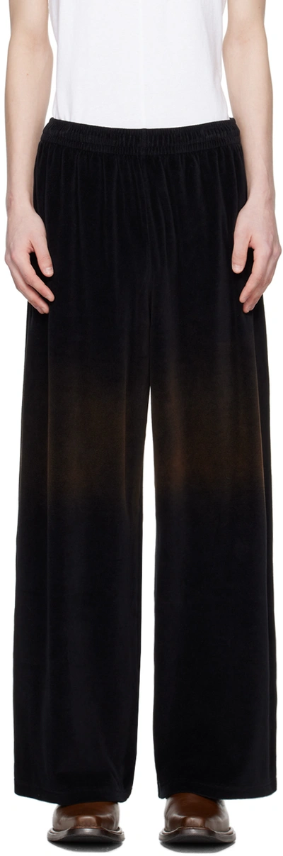Shop Acne Studios Black Embossed Trousers In 900 Black