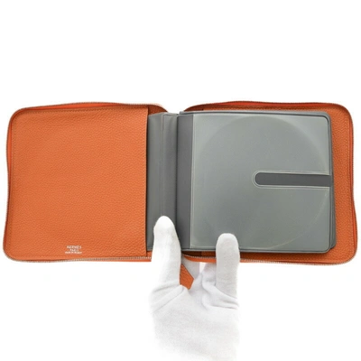 Shop Hermes Hermès Orange Leather Wallet  ()