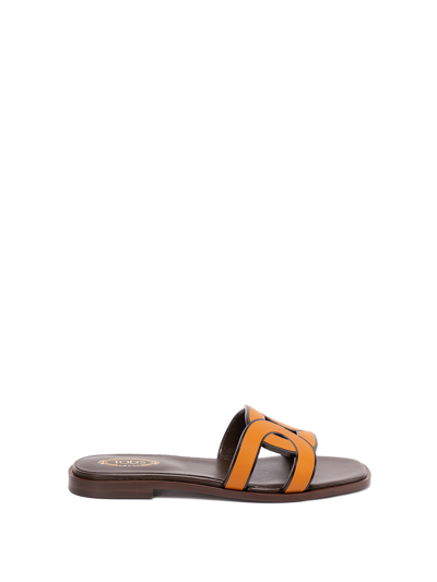 Shop Tod's Flat Sandals In Yellow