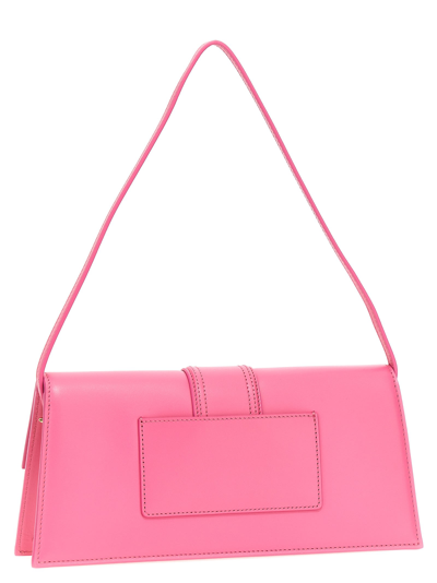 Shop Jacquemus Le Bambino Long Shoulder Bag In Fucsia