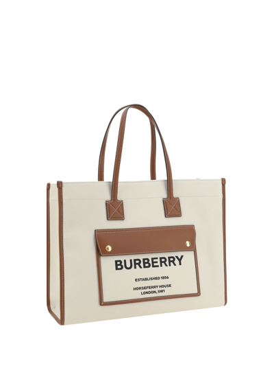 Shop Burberry Frey Shoulder Bag In Beige