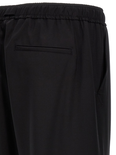 Shop Msgm Cargo Pants In Black