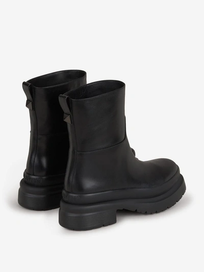 Shop Valentino Garavani Roman Stud Leather Boots In Black