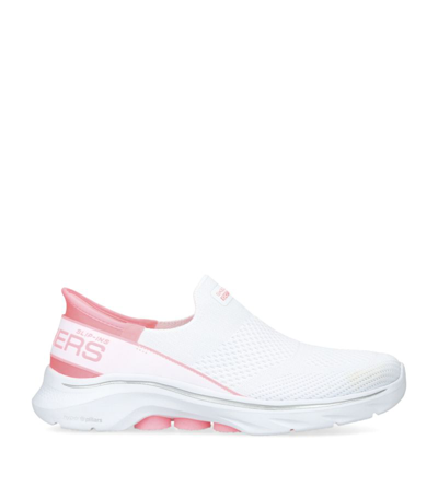 Shop Skechers Go Walk 7 Mia Slip-on Sneakers In White