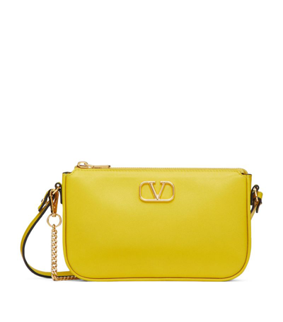 Shop Valentino Mini Leather Vlogo Cross-body Bag In Yellow