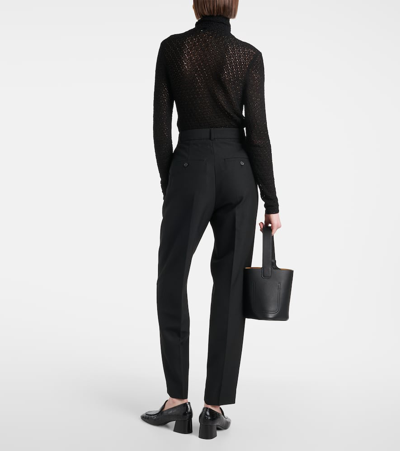 Shop Totême High-rise Tapered Pants In Black