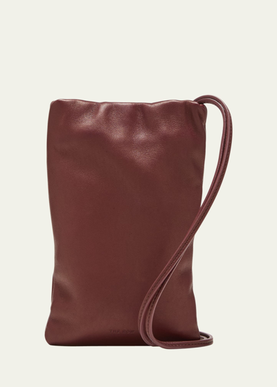Shop The Row Bourse Phone Case In Napa Leather In Bgag Burgundy Ang