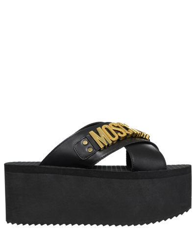 Shop Moschino Lettering Logo Wedges In Black