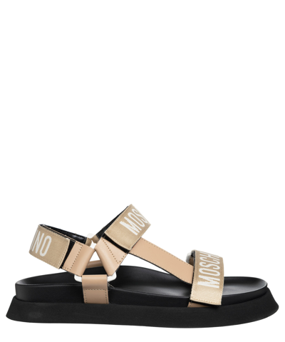 Shop Moschino Sandals In Beige