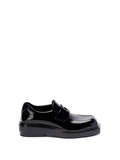 Shop Prada Brushed Leather Loafers In Black  