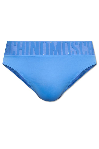 Shop Moschino Logo Rubberised Waistband Stretch Swim Trunks In Blue