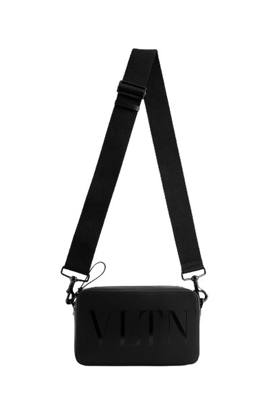 Shop Valentino Vltn Leather Crossbody Bag In Black