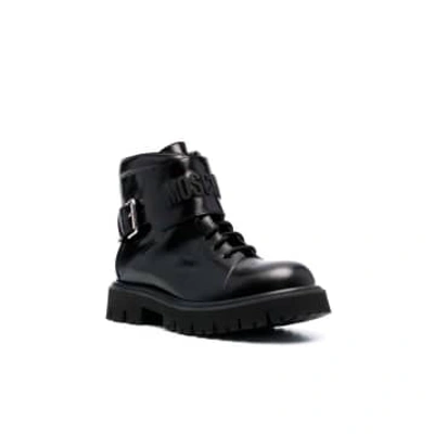 Shop Moschino Leather Boots With A Relief Logo In Black