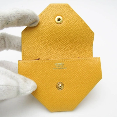 Shop Hermes Hermès 24 Yellow Leather Wallet  ()