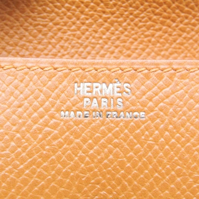 Shop Hermes Hermès 24 Yellow Leather Wallet  ()