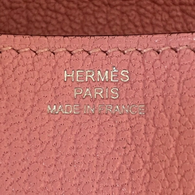 Shop Hermes Hermès Porte-monnaie 24 Pink Leather Wallet  ()