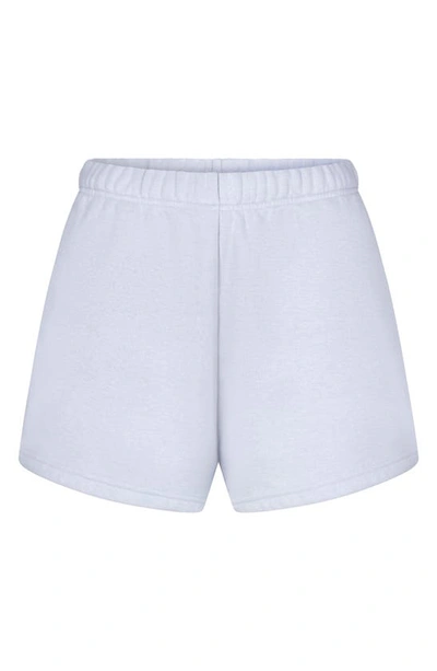 Shop Skims Cotton Blend Fleece Classic Shorts In Periwinkle