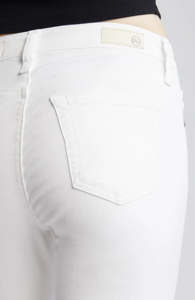 Shop Ag Angel Raw Hem Mid Rise Bootcut Jeans In White