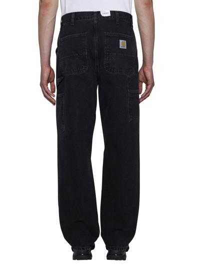 Shop Carhartt Jeans In Black Stone Washed