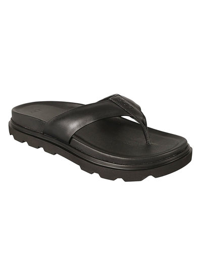 Shop Ugg Capitol Thong Sliders In Black