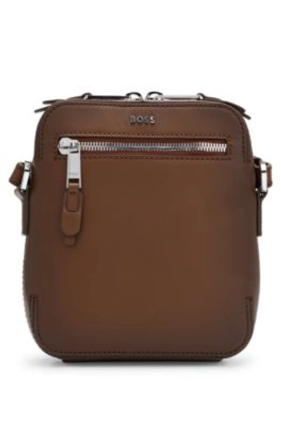 Shop Hugo Boss Leather Reporter Bag With Metallic Logo Lettering In Brown