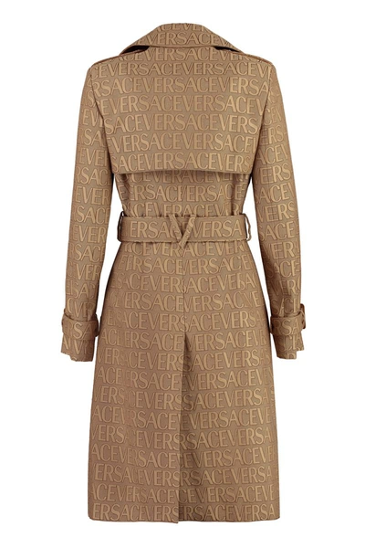 Shop Versace Cotton Blend Trench Coat In Beige