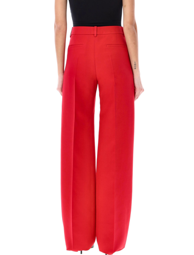 Shop Valentino Crepe Couture Trousers In Red