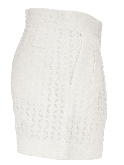 Shop Michael Kors Eyelet Pleated Shorts In White
