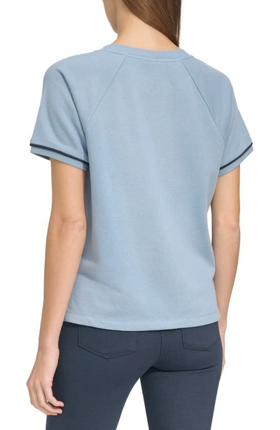 Shop Andrew Marc Piped Top In Faded Denim