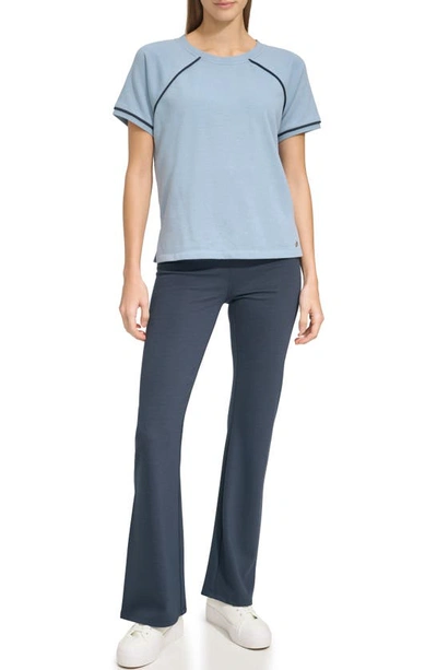 Shop Andrew Marc Piped Top In Faded Denim