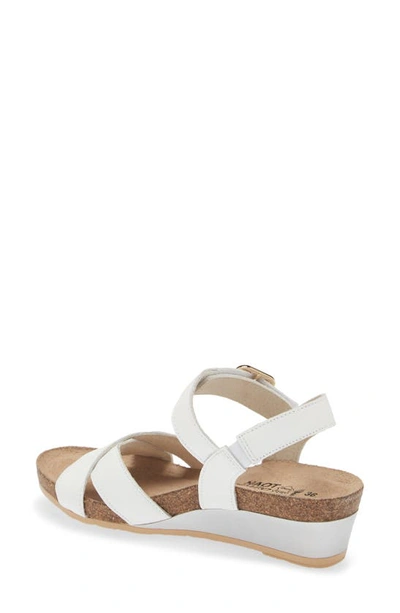 Shop Naot Throne Wedge Sandal In Soft White Leather