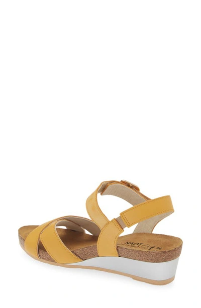 Shop Naot Throne Wedge Sandal In Marigold Leather