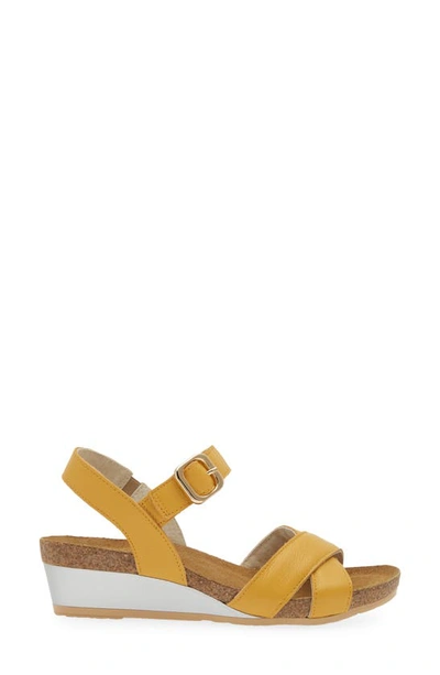 Shop Naot Throne Wedge Sandal In Marigold Leather