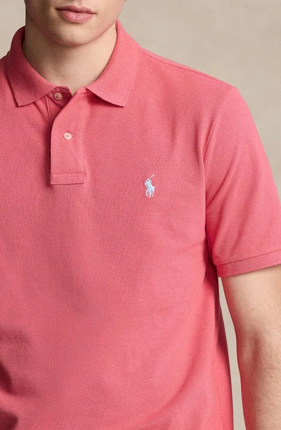 Shop Polo Ralph Lauren Solid Piqué Knit Polo In Pale Red