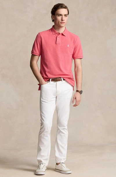 Shop Polo Ralph Lauren Solid Piqué Knit Polo In Pale Red