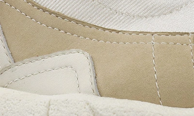 Shop Zigi Torani Platform Sneaker In White/beige